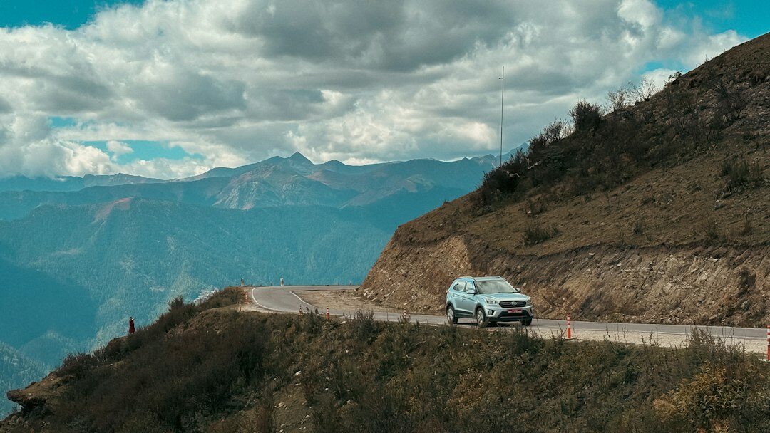 electric suv on mountain road